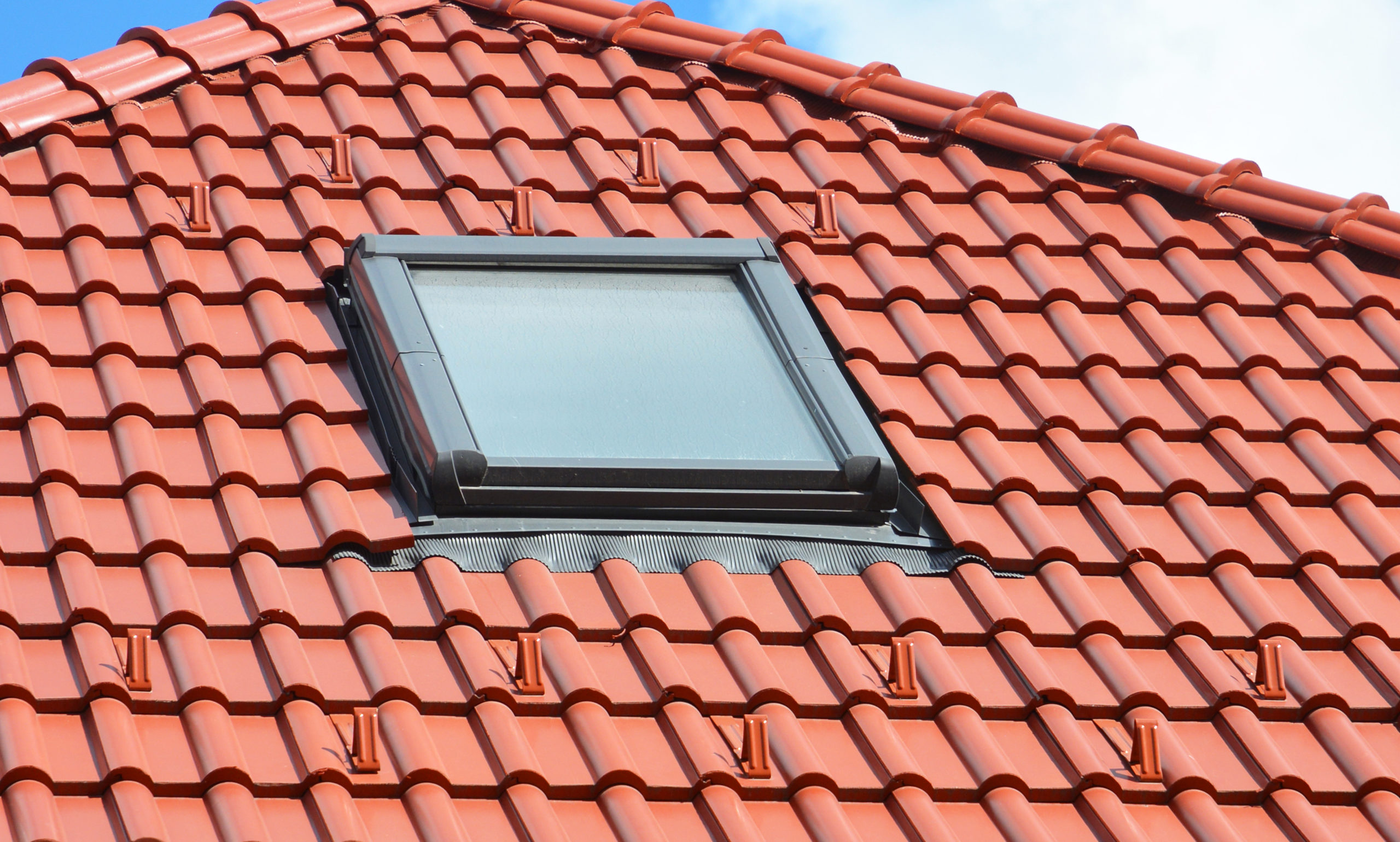 A,Close-up,On,A,Skylight,Installation,On,The,Ceramic,Tiled, seattle skylight installation and cleaning